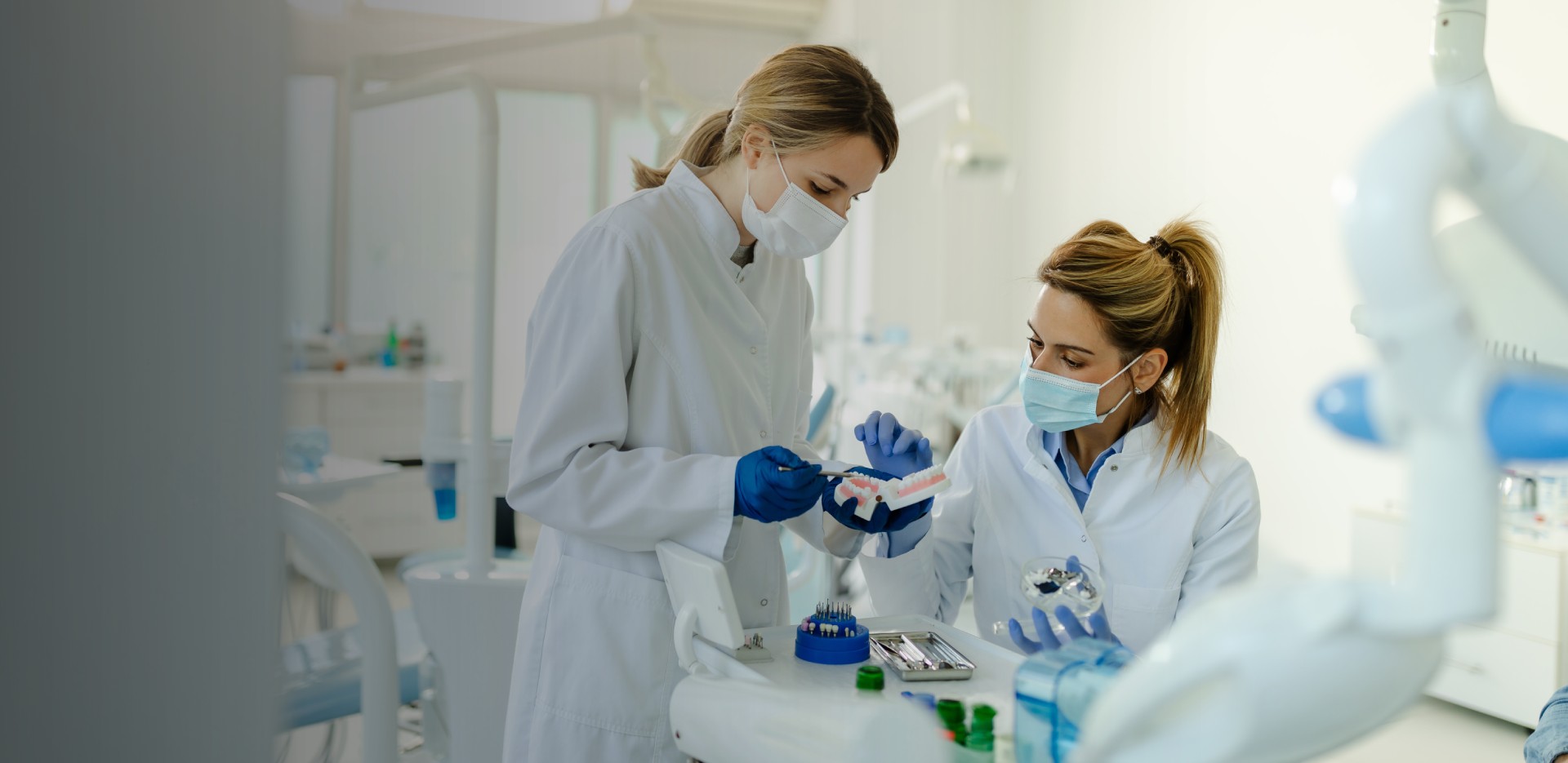 qualified-female-dental-technician-holding-dental-2021-09-03-14-34-32-utc_3